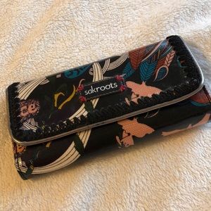 Never been worn Sakroots multi colored wallet